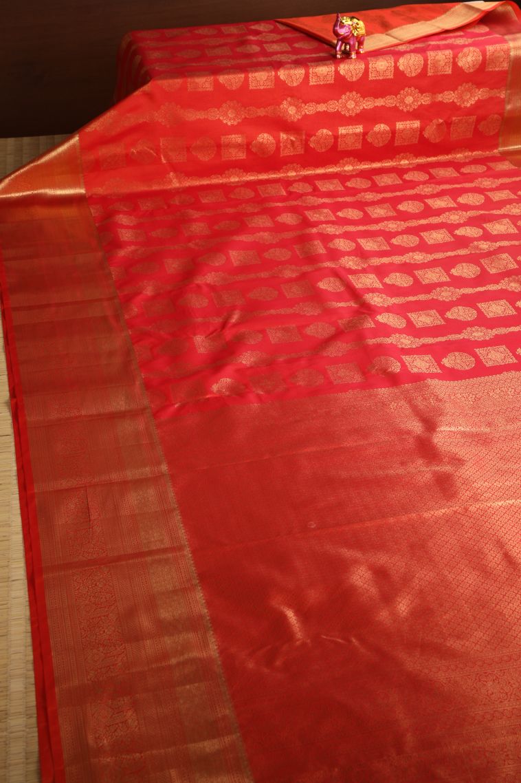 Tiger Orange Apoorva Silk Sarees with Gold Zari Floral Patterns view 2