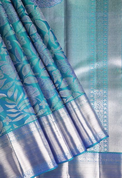 Cerulean Blue Kanchipuram Silk Sarees with Silver Zari Floral Patterns