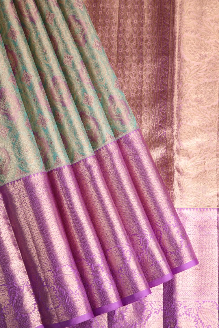 Pistachio Green Kanchipuram Silk Sarees with Gold Zari Floral Patterns view 1