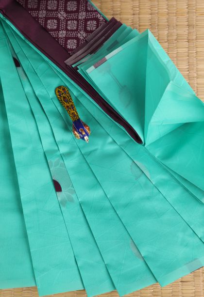 Mint Green Visiri Madippu Silk Sarees with Silver Zari Floral Patterns