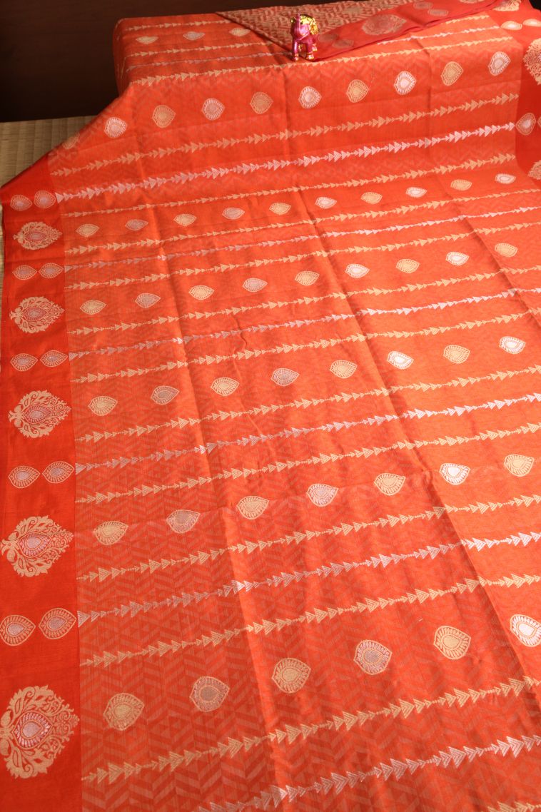 Fire Orange Semi Raw Silk Printed with Gold And Silver Zari Leaf Pattern view 2