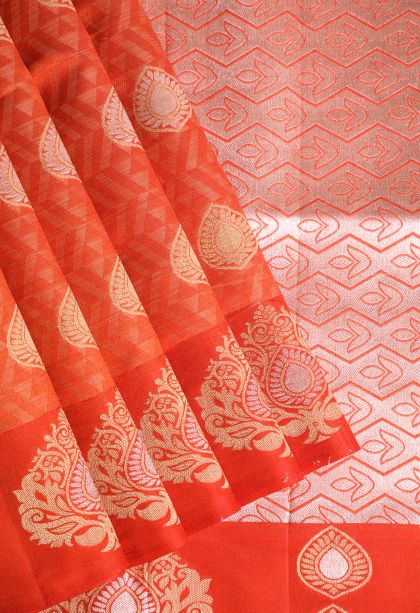 Fire Orange Semi Raw Silk Printed with Gold And Silver Zari Leaf Pattern