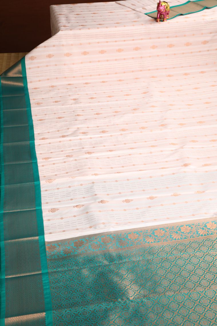 Lace White Visiri Madippu Silk Sarees with Copper Zari Floral Puttas view 2