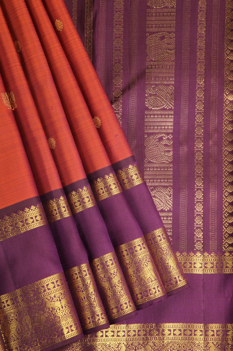 Yam Orange Kanchipuram Silk Sarees with Gold Zari Peacock And Rudhractam view 1