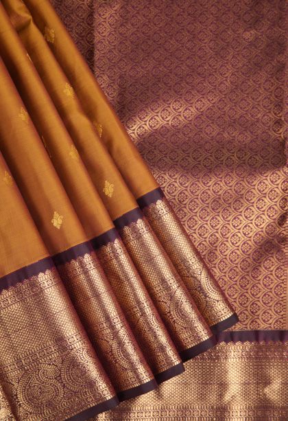 Cider Orange Soft Silk Saree with Gold Zari Floral Puttas