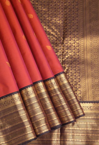 Dawn Red Soft Silk Saree with Gold Zari Floral Puttas