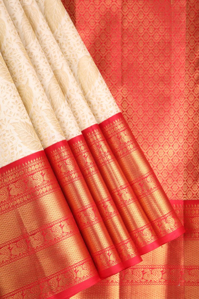 Linen White Kanchipuram Silk Sarees with Gold Zari Leaf Pattern