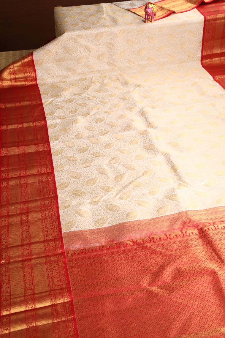 Linen White Kanchipuram Silk Sarees with Gold Zari Leaf Pattern view 2