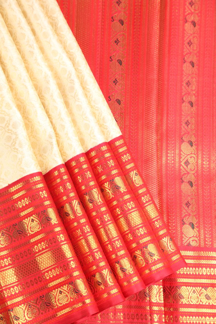 Cream White Kanchipuram Silk Sarees with Gold Zari Floral Patterns view 1