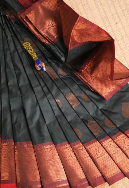 Bottle Green Visiri Madippu Silk Sarees with Copper Zari Floral Patterns