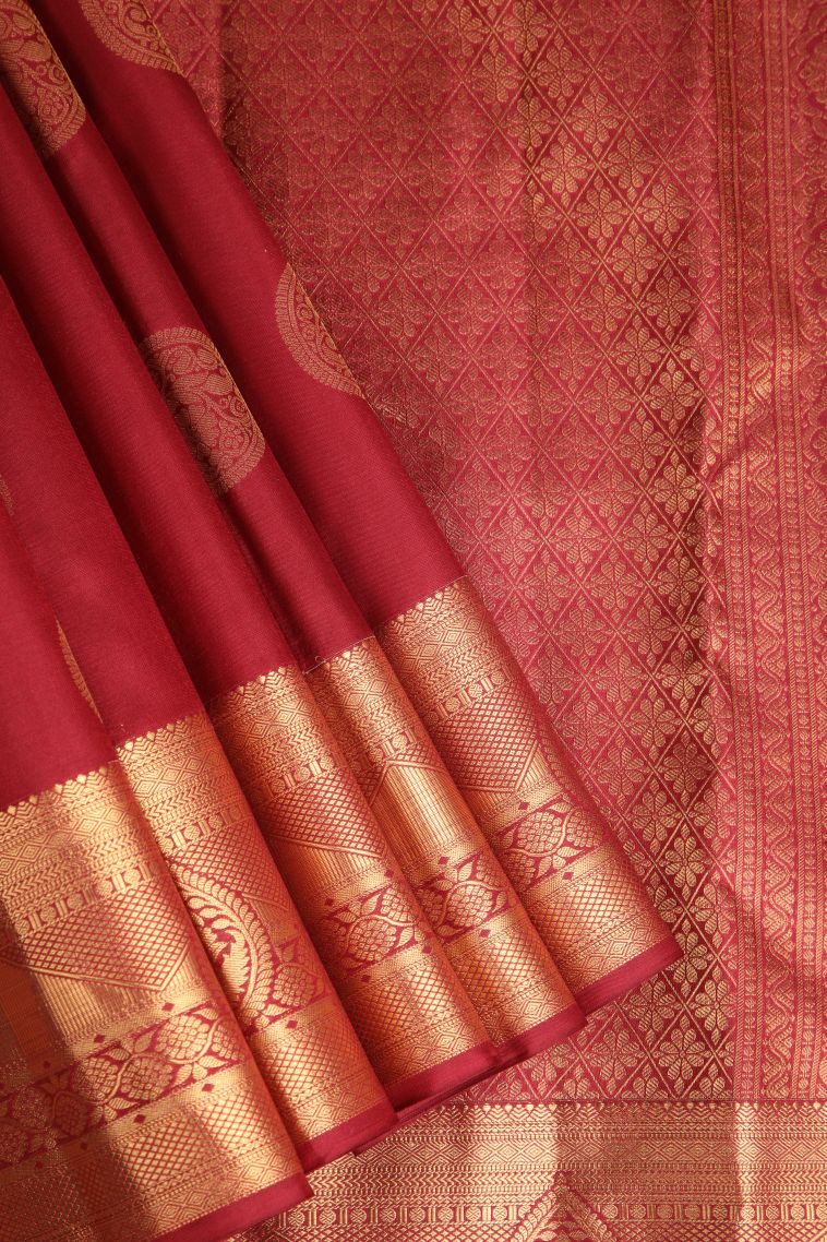 Dawn Red Soft Silk Saree with Gold Zari Floral Puttas