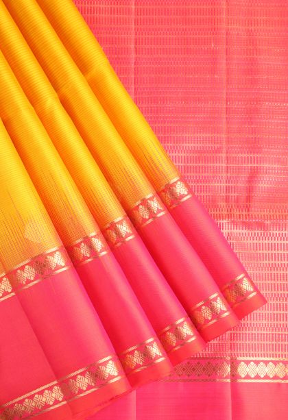 Sandstone Orange Soft Silk Saree with Gold Zari Floral Puttas