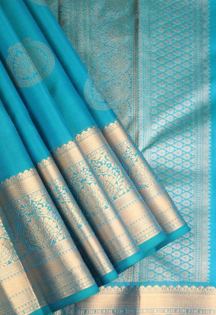 Cerulean Blue Soft Silk Saree with Gold Zari Floral Puttas