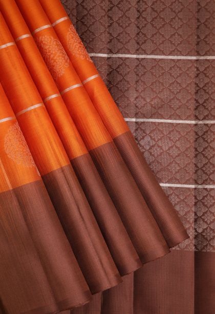 Rust Orange Soft Silk Saree with Gold Zari Floral Puttas