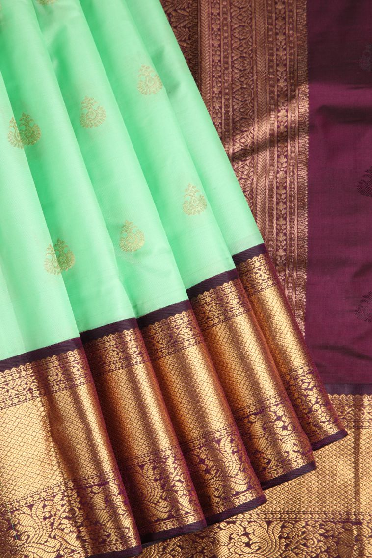 Mint Green Soft Silk Saree with Gold Zari Puttas view 1