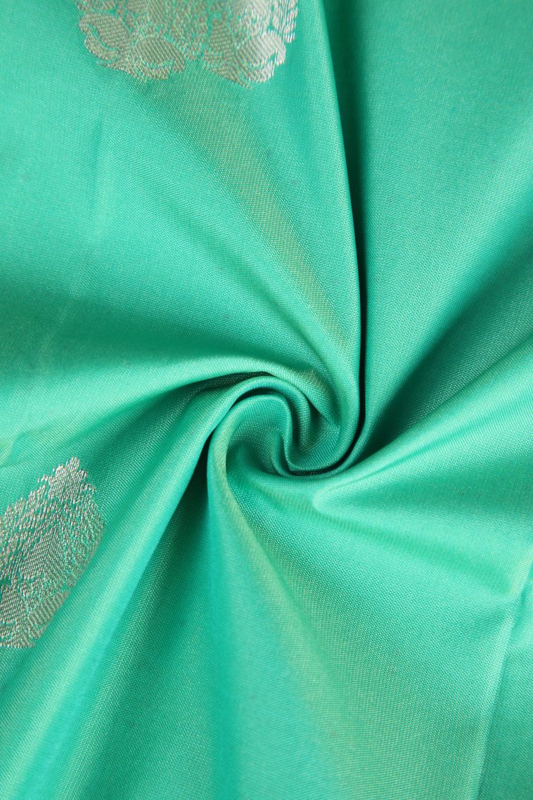 Teal Blue Visiri Madippu Silk Sarees with Silver Zari Floral Puttas view 4