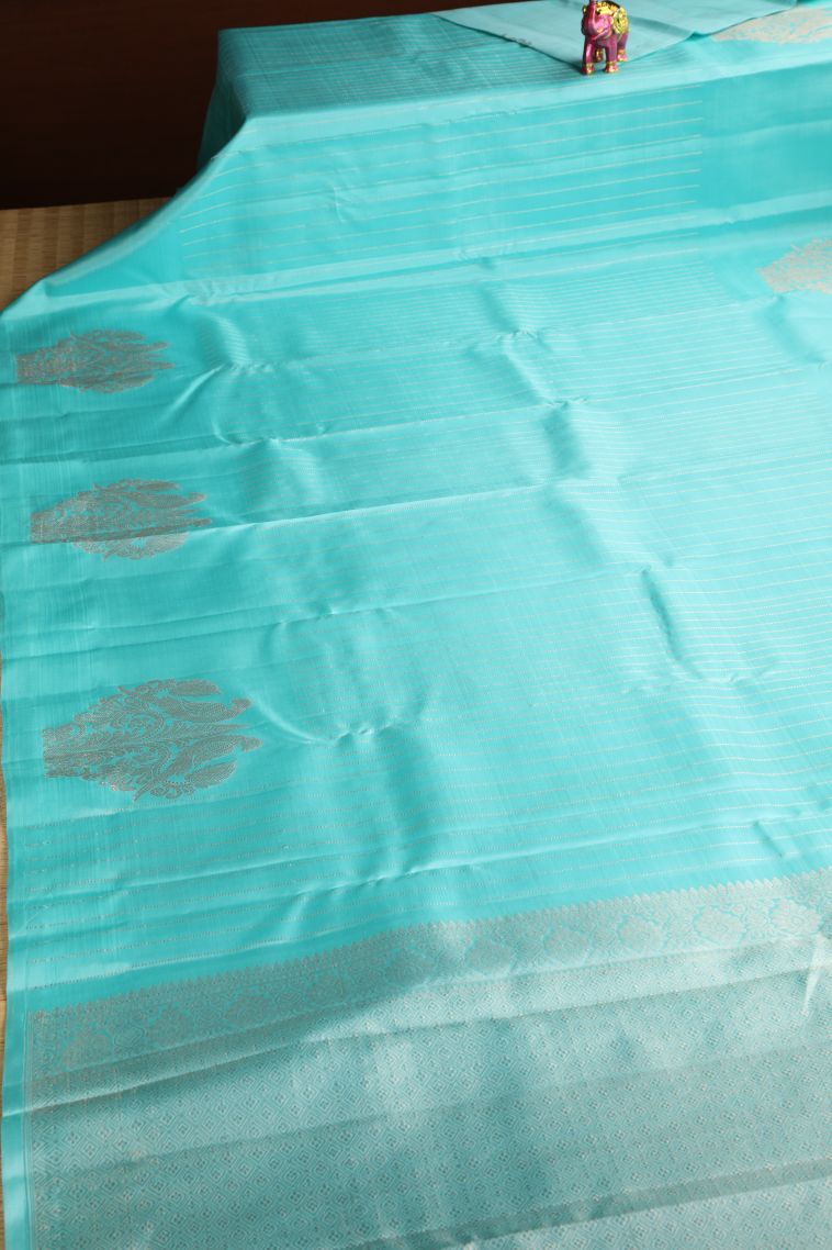 Sky Blue Kanchipuram Silk Sarees with Gold Zari Straipes And Puttas view 2