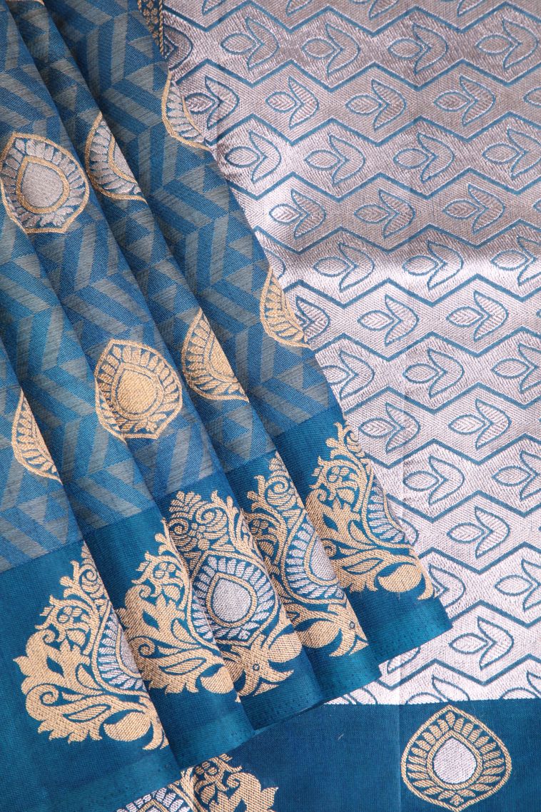 Aegean Blue Semi Raw Silk Printed with Gold And Silver Zari Leaf Pattern