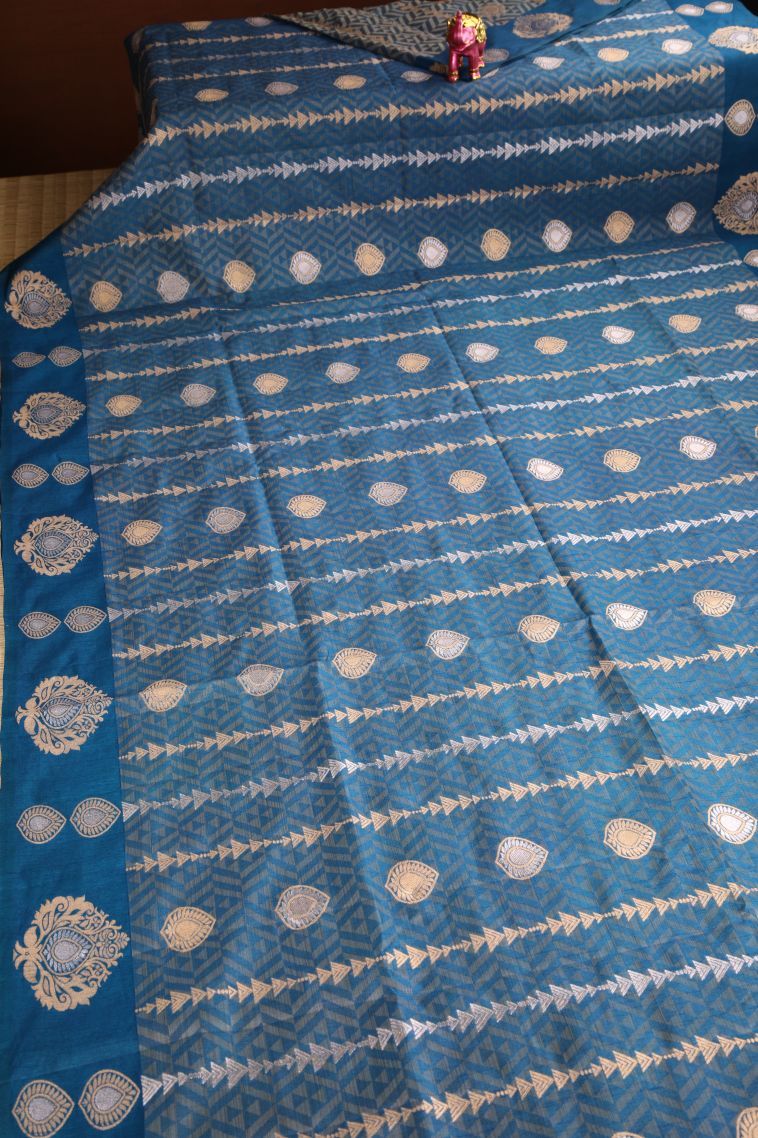 Aegean Blue Semi Raw Silk Printed with Gold And Silver Zari Leaf Pattern view 2