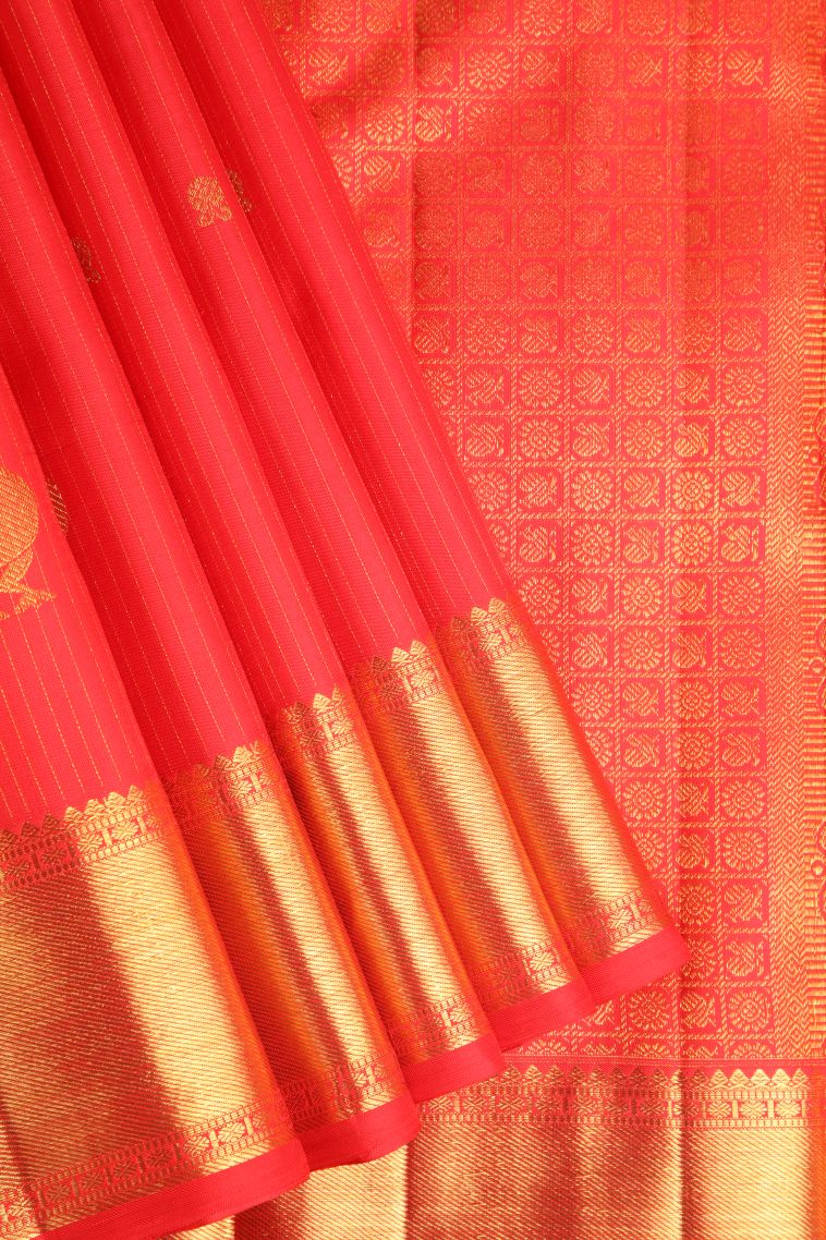 Dawn Red Kanchipuram Silk Sarees with Gold Zari Straipes And Puttas view 1