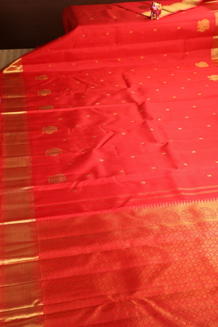 Dawn Red Kanchipuram Silk Sarees with Gold Zari Straipes And Puttas view 2