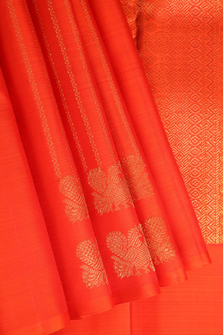 Fire Orange Kanchipuram Silk Sarees with Gold Zari Peacock Motifs view 1