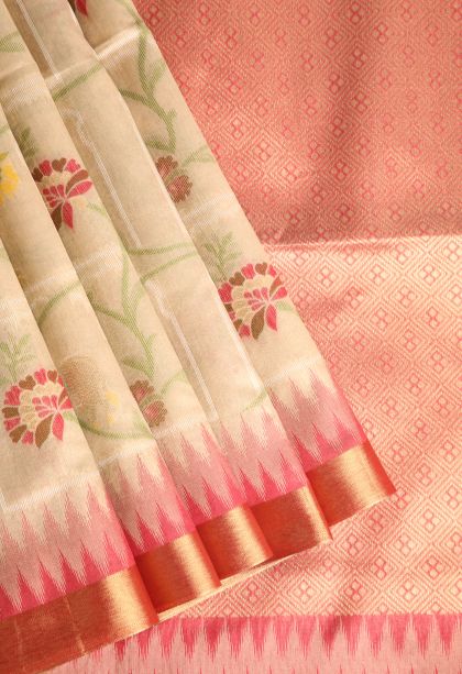 Oat Yellow Jute Sarees with Gold And Silver Zari Floral Patterns