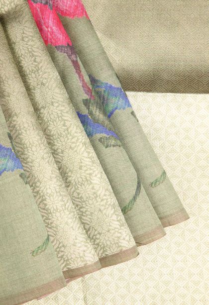 Pistachio Green Tussar Saree with Antic Zari Floral Puttas