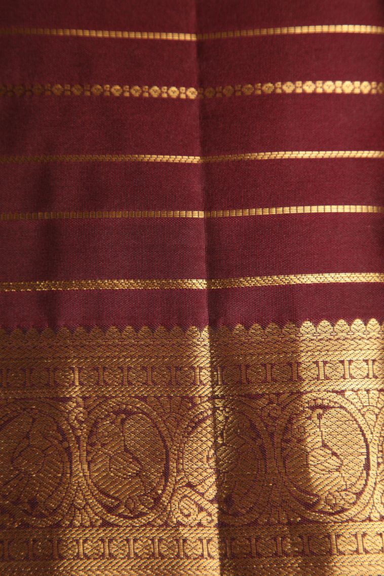 Crimson Red Kanchipuram Silk Sarees with Gold Zari Straipes And Puttas view 3