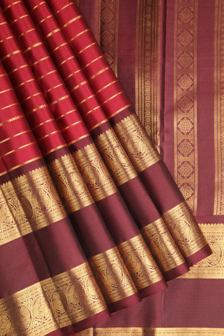 Crimson Red Kanchipuram Silk Sarees with Gold Zari Straipes And Puttas view 1
