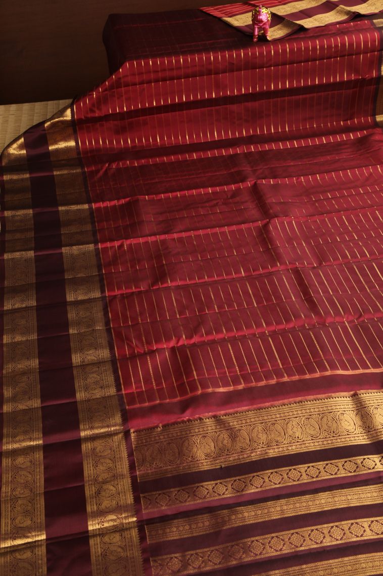 Crimson Red Kanchipuram Silk Sarees with Gold Zari Straipes And Puttas view 2