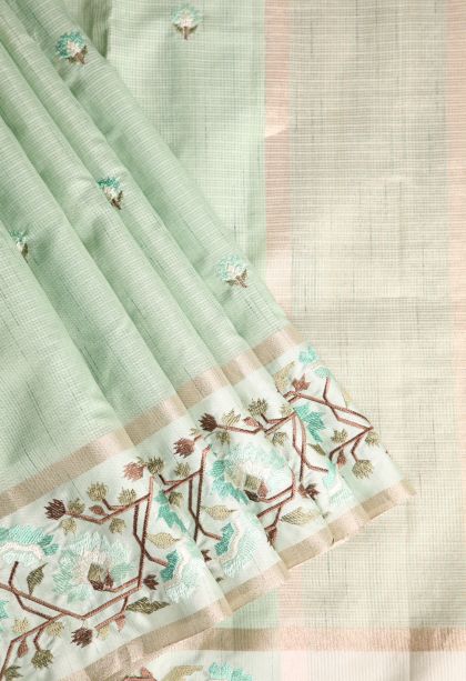 Pistachio Green Jute Sarees with Gold Zari Floral Puttas Embroidary