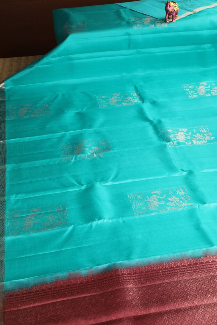 Arctic Blue Soft Silk Saree with Gold And Silver Zari Birds And Floral Pattern view 2