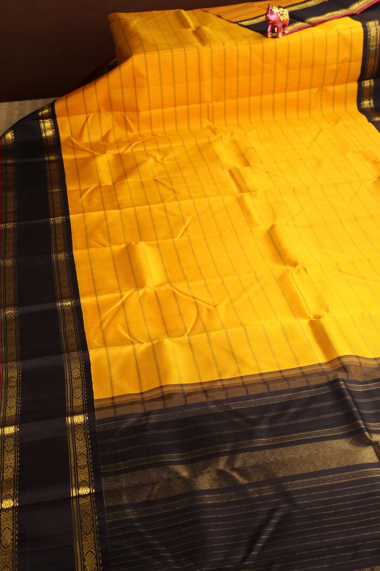 Briht Yellow Kanchipuram Silk Sarees with Gold Zari Stripes view 2