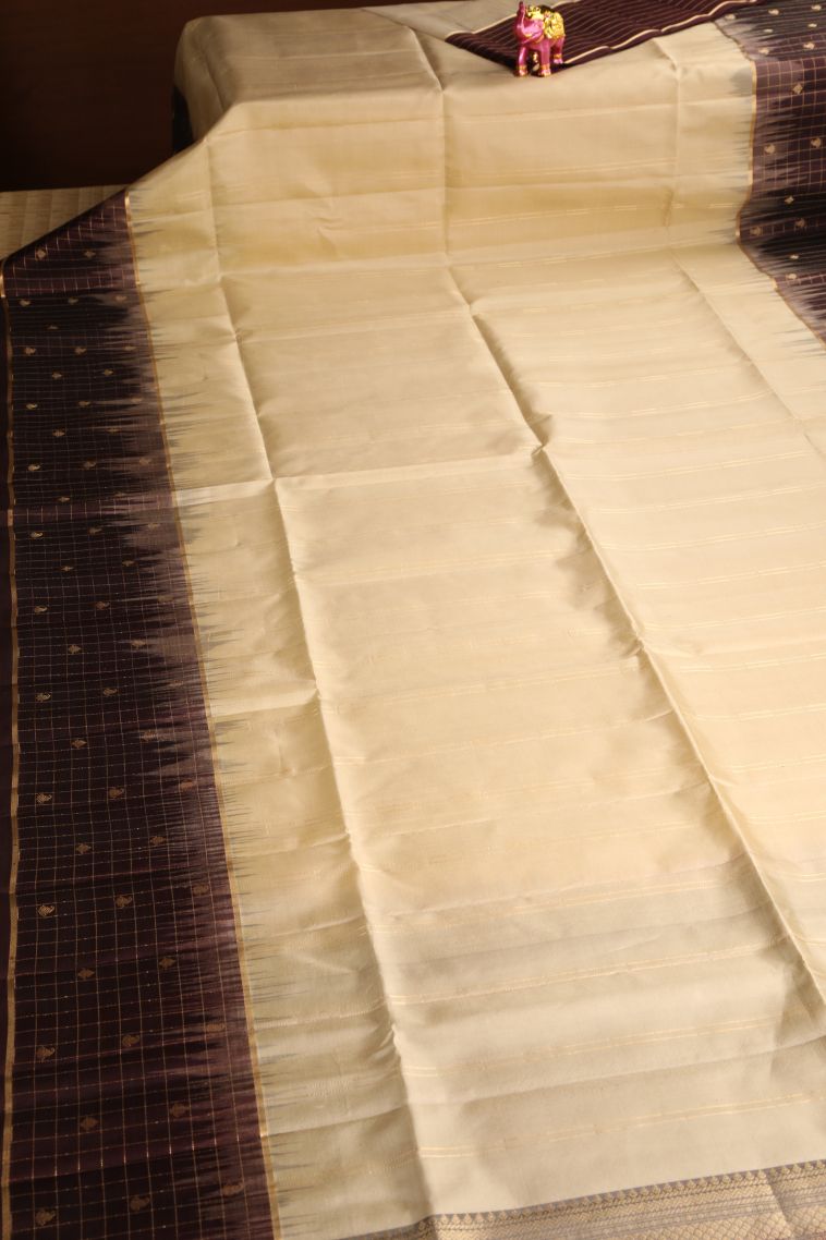 Cookie Yellow Soft Silk Saree with Gold Zari Straipes And Puttas view 2