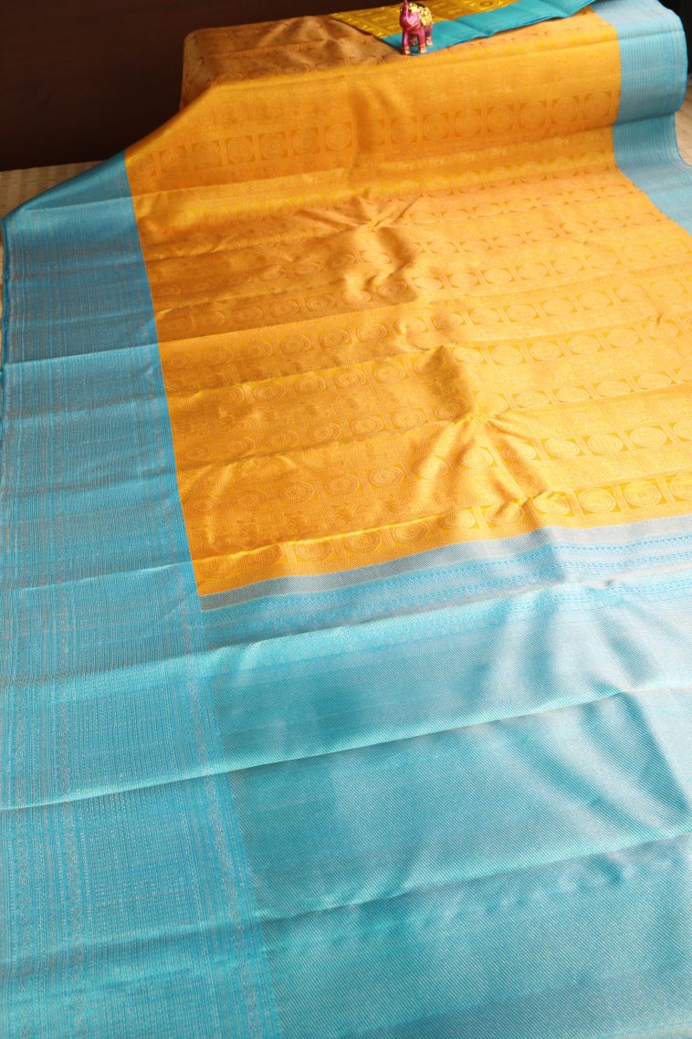 Merigold Orange Kanchipuram Silk Sarees with Gold And Silver Zari Circle Mottif view 2