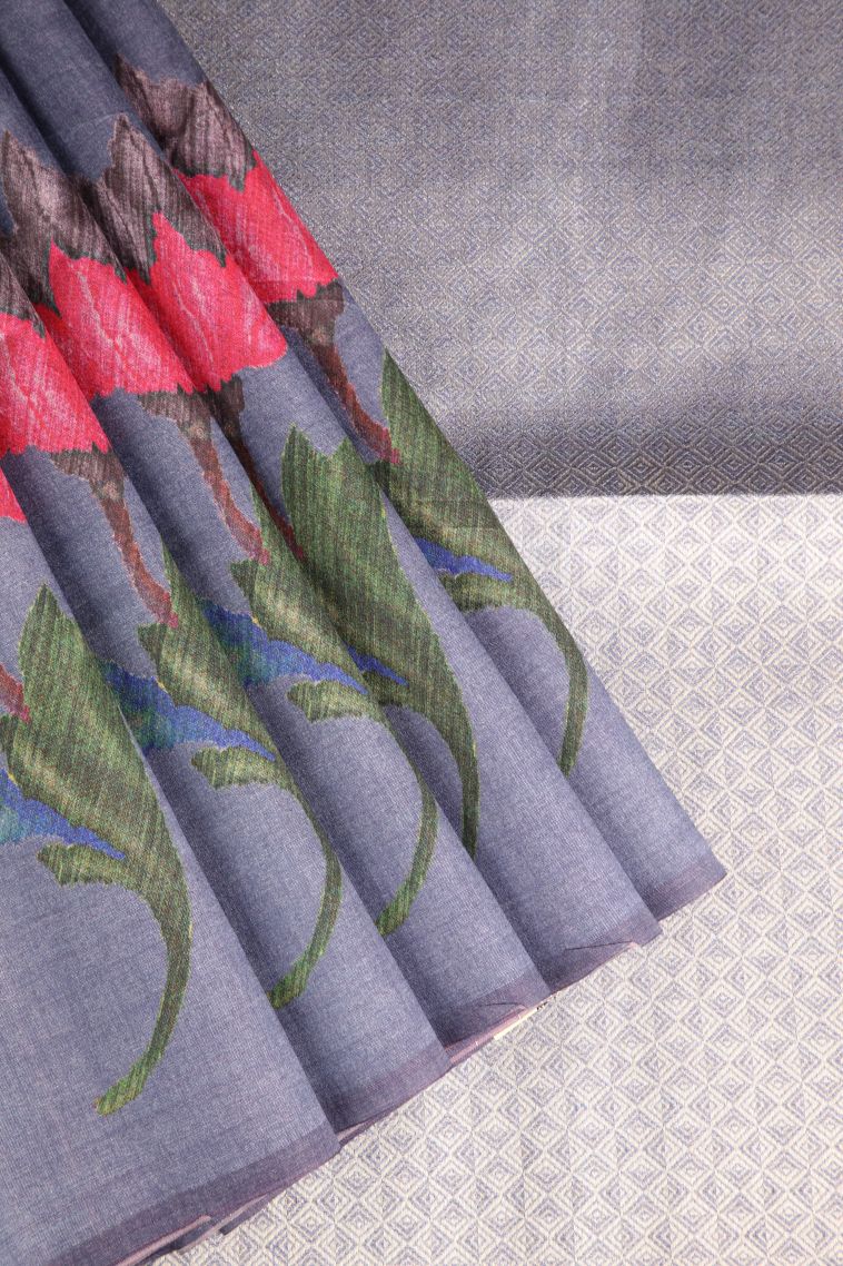 Daffane Blue Tussar Saree with Antic Zari Floral Puttas