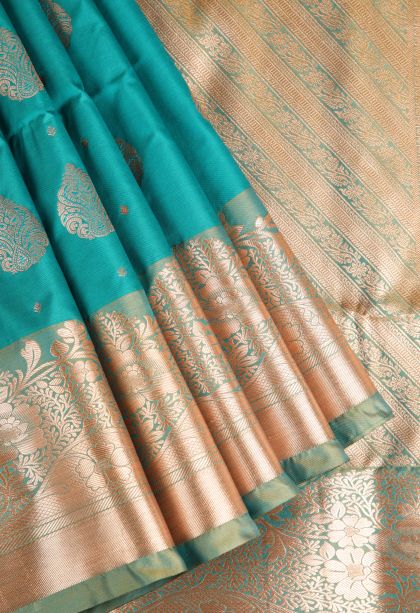 Teal Blue Apoorva Silk Sarees with Copper Zari Floral Puttas