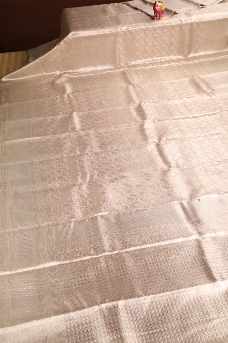 Coconut White Kanchipuram Silk Sarees with Silver Zari Leaf Pattern view 2