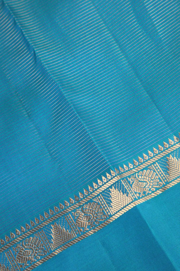 Cerulean Blue Soft Silk Saree with Gold Zari Mango Puttas view 3