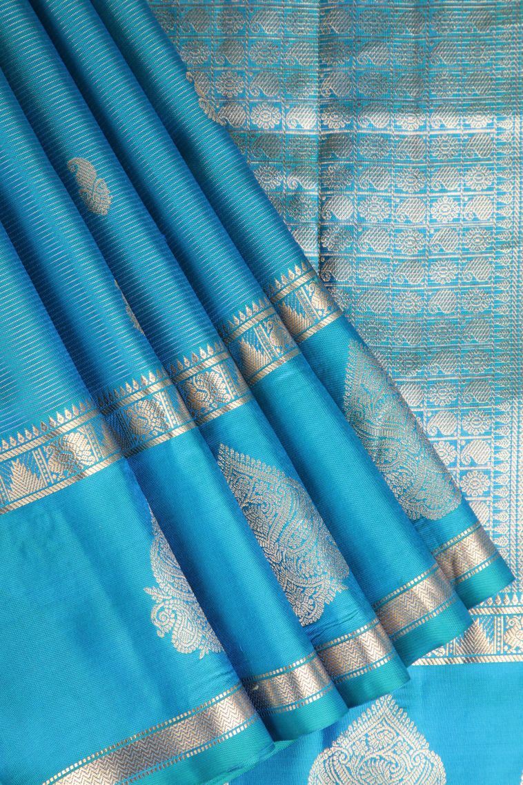 Cerulean Blue Soft Silk Saree with Gold Zari Mango Puttas view 1