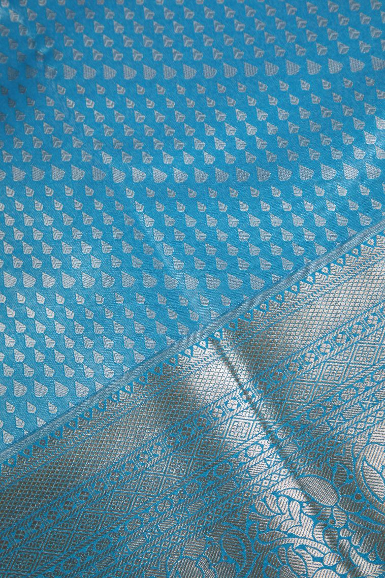 Cerulean Blue Apoorva Silk Sarees Silver Zari with Floral Puttas view 3