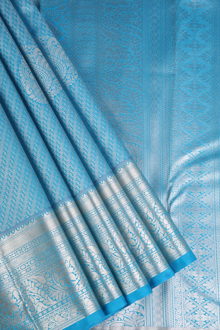 Cerulean Blue Apoorva Silk Sarees Silver Zari with Floral Puttas