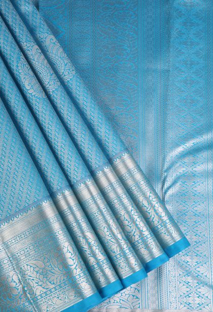 Cerulean Blue Apoorva Silk Sarees Silver Zari with Floral Puttas