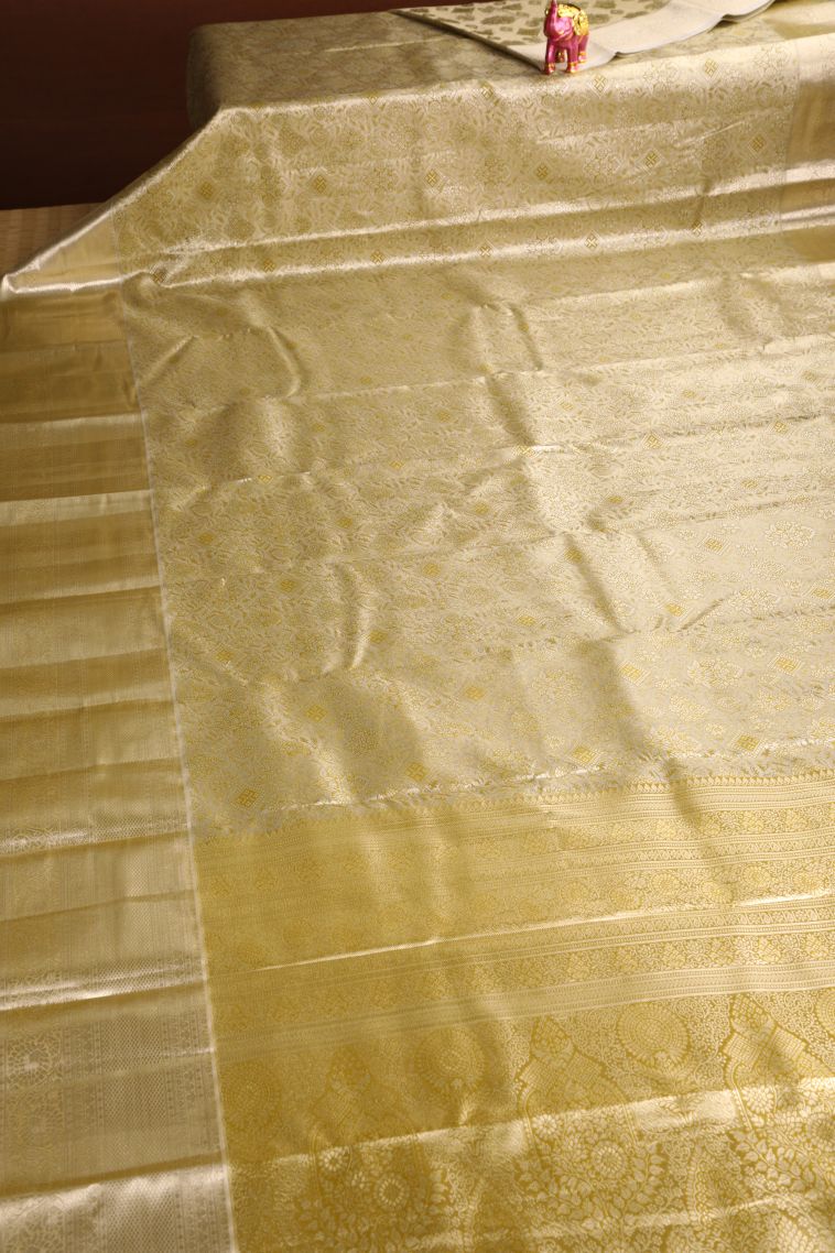 Biscotti Yellow Apoorva Silk Sarees with Silver Zari Floral Patterns view 2