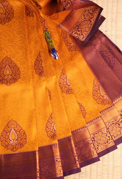 Apricot Orange Visiri Madippu Silk Sarees with Copper Zari Floral Patterns