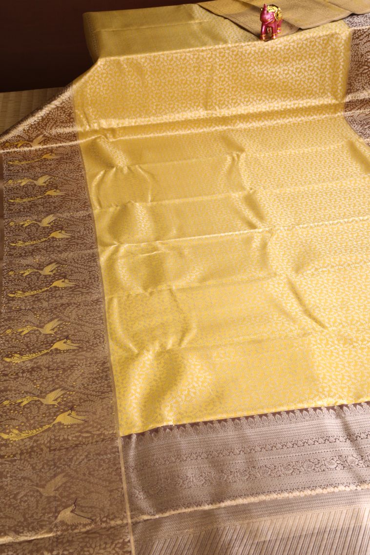 Macaroon Yellow Apoorva Silk Sarees with Gold And Silver Zari Floral Puttas view 2
