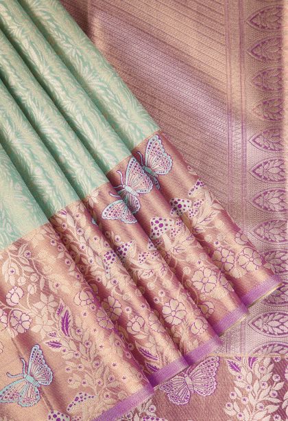 Mint Green Apoorva Silk Sarees with Gold And Silver Zari Floral Puttas