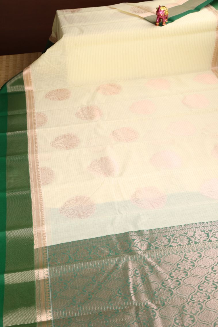 Cream White Silk Cotton Sarees with Copper Zari Floral Patterns view 2