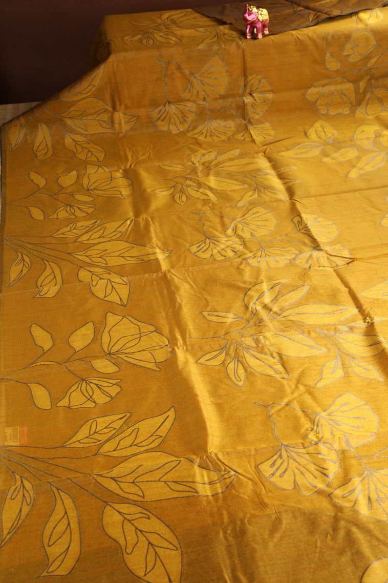 Macaroon Yellow Jute Sarees with Silver Zari Floral Patterns view 2
